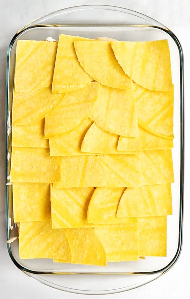 Layer of corn tortillas on King Ranch Casserole.
