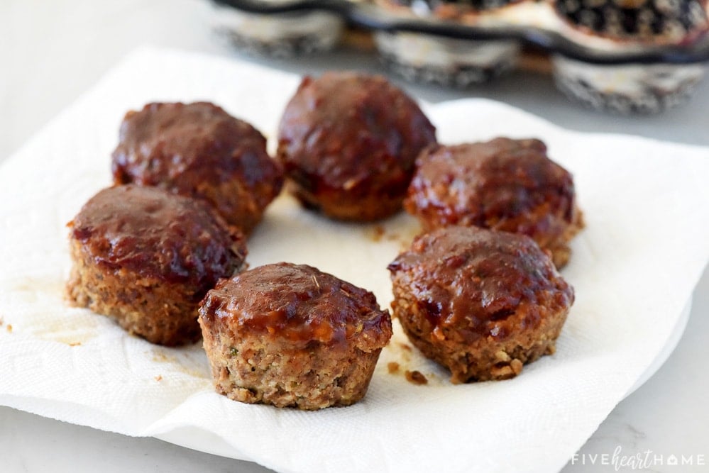 Draining Meatloaf Muffins on paper towel.