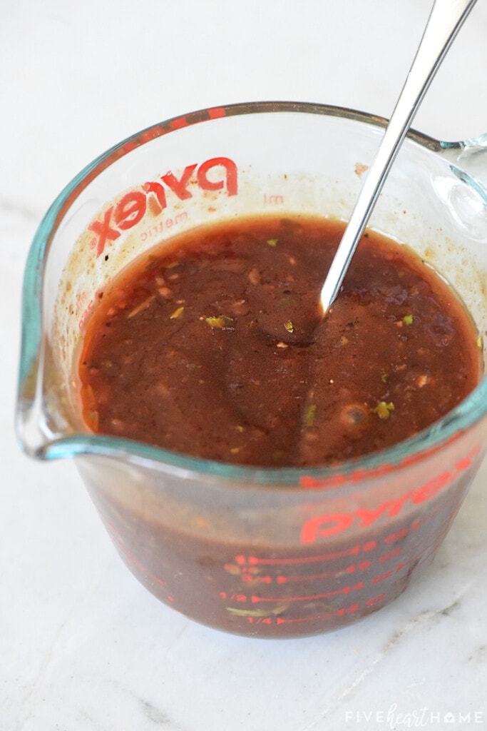 Glaze ingredients mixed in measuring cup.