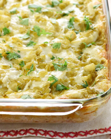 Chicken Enchilada Casserole in glass baking dish.