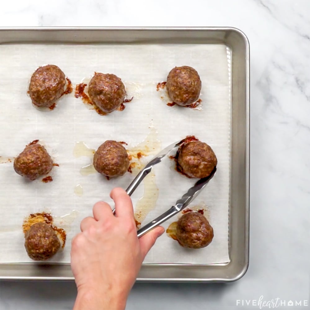 Cooked Hawaiian Meatballs on baking sheet.