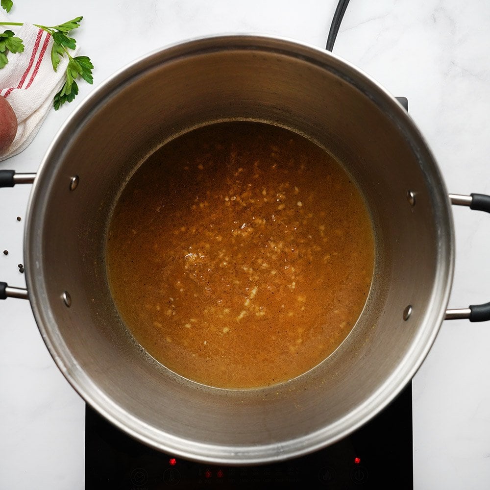 Bacon grease in pot plus other ingredients to make dressing for German Potato Salad.