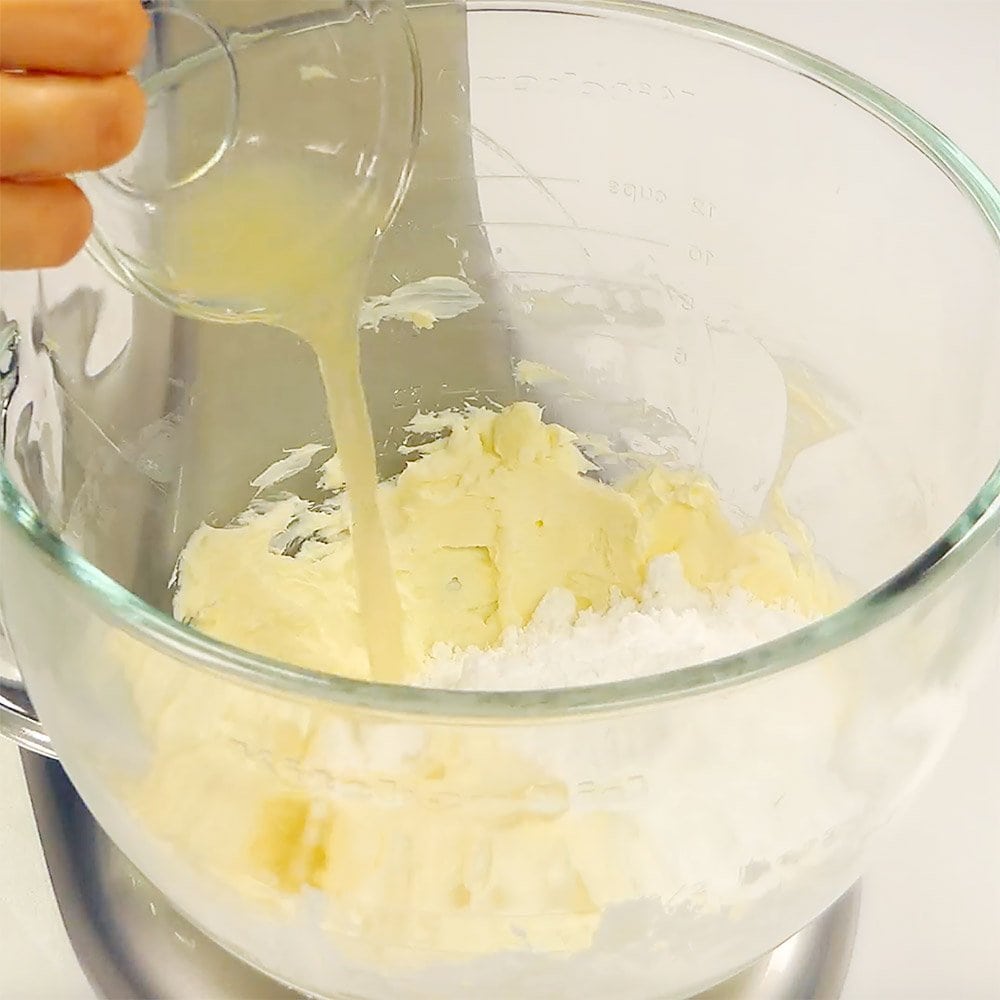 Adding powdered sugar, juice, and zest.