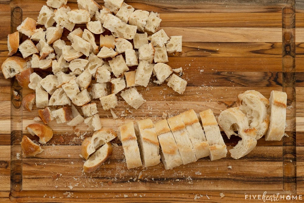 Cutting bread in cubes for crouton recipe.