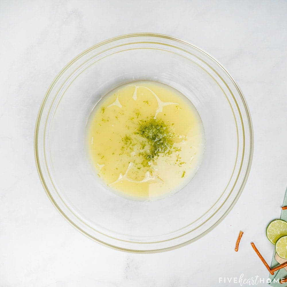 Combining filling ingredients in a bowl.