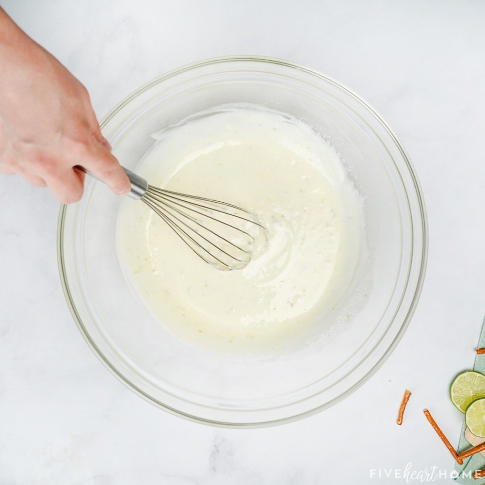 Stirring in the condensed milk.