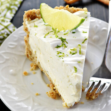 Slice of No-Bake Frozen Margarita Pie on a plate.