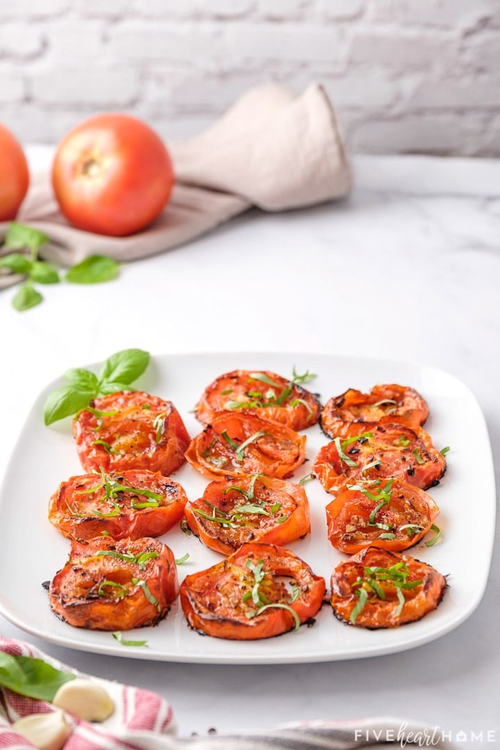 Roasted Tomatoes recipe on a white platter.