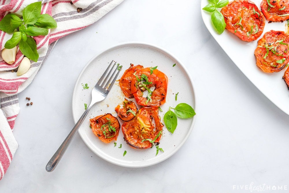 Aerial view of Roasted Tomatoes on plate with fork.