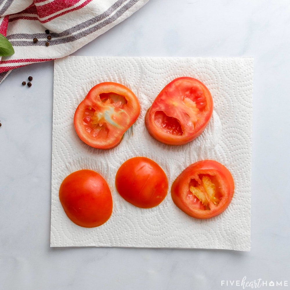 Slices draining on paper towel.