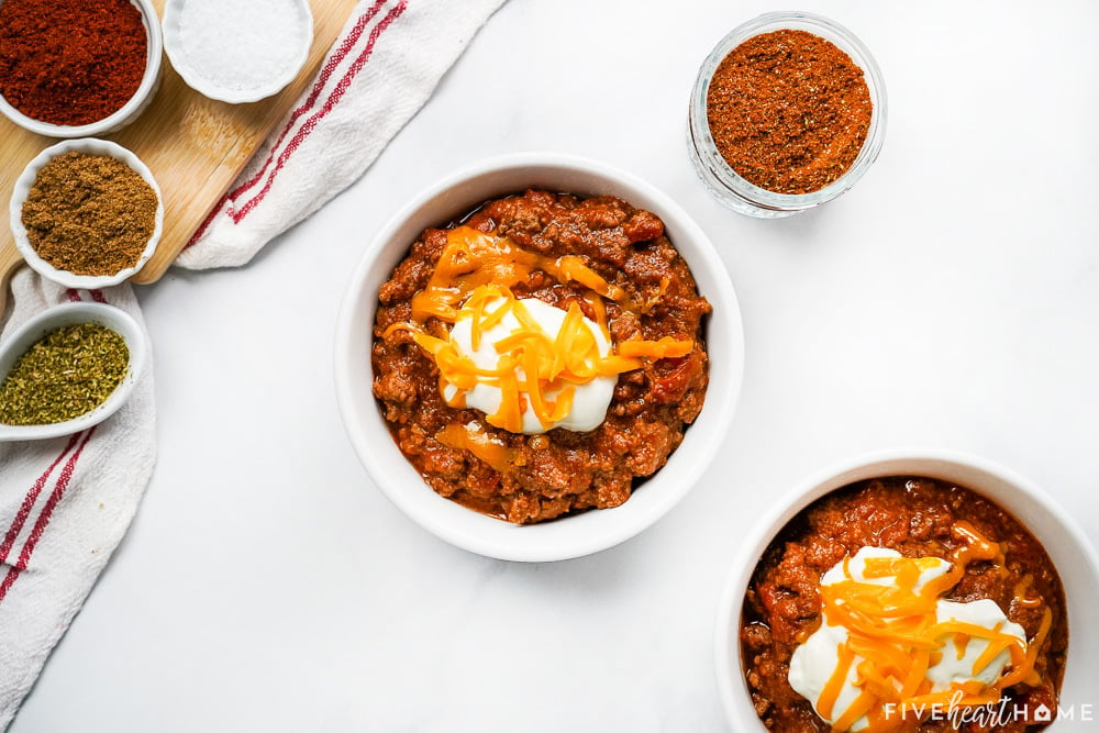 Aerial view of Chili Seasoning in a jar plus ingredients to make it.