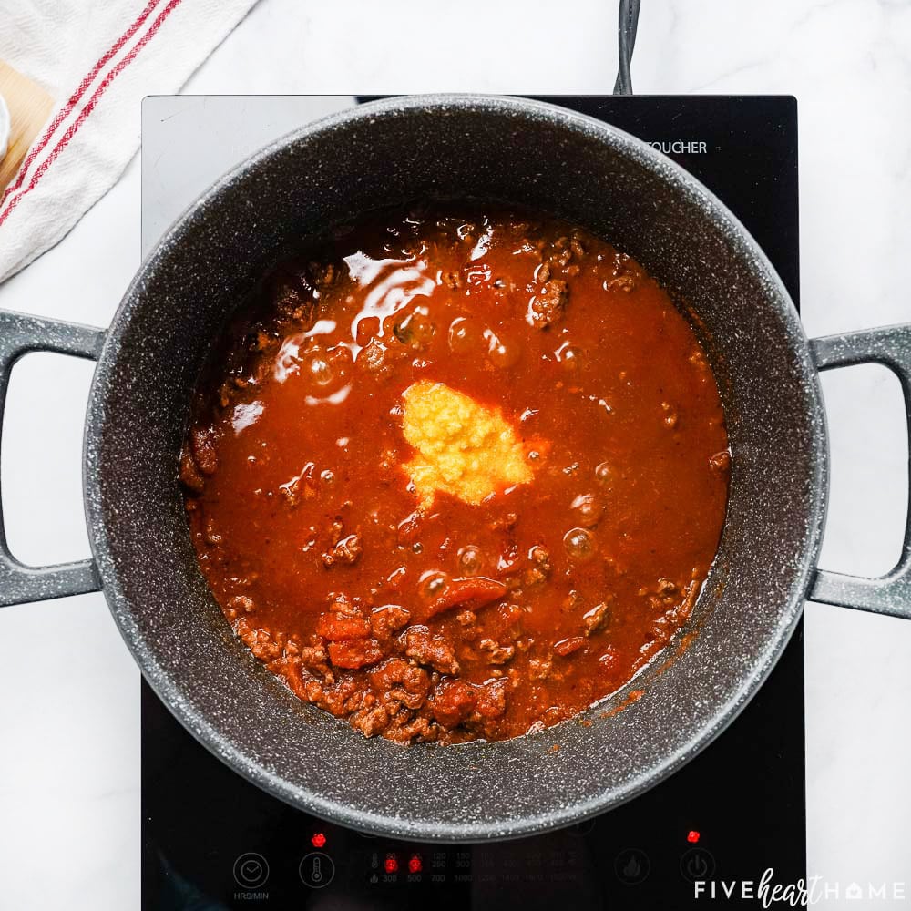 Chili seasoning stirred into other ingredients with masa.