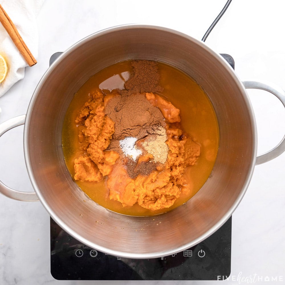 Adding cinnamon and other spices.