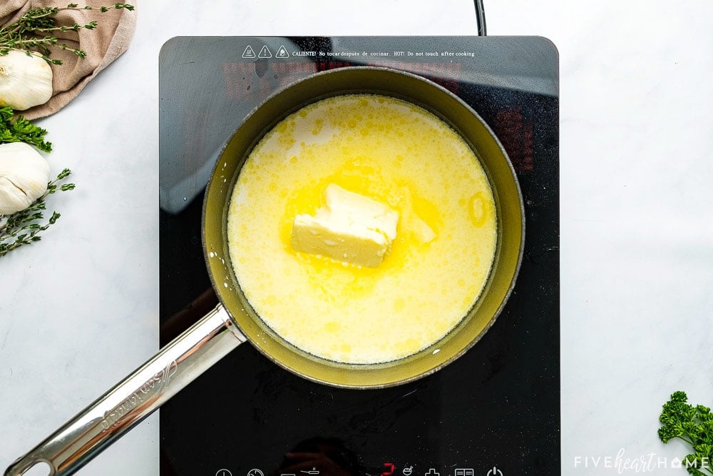 Melted butter and milk in saucepan.
