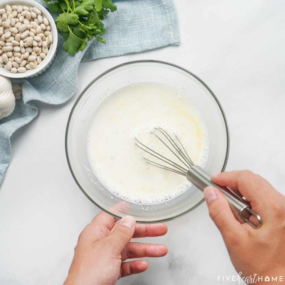 Mixing masa into milk.