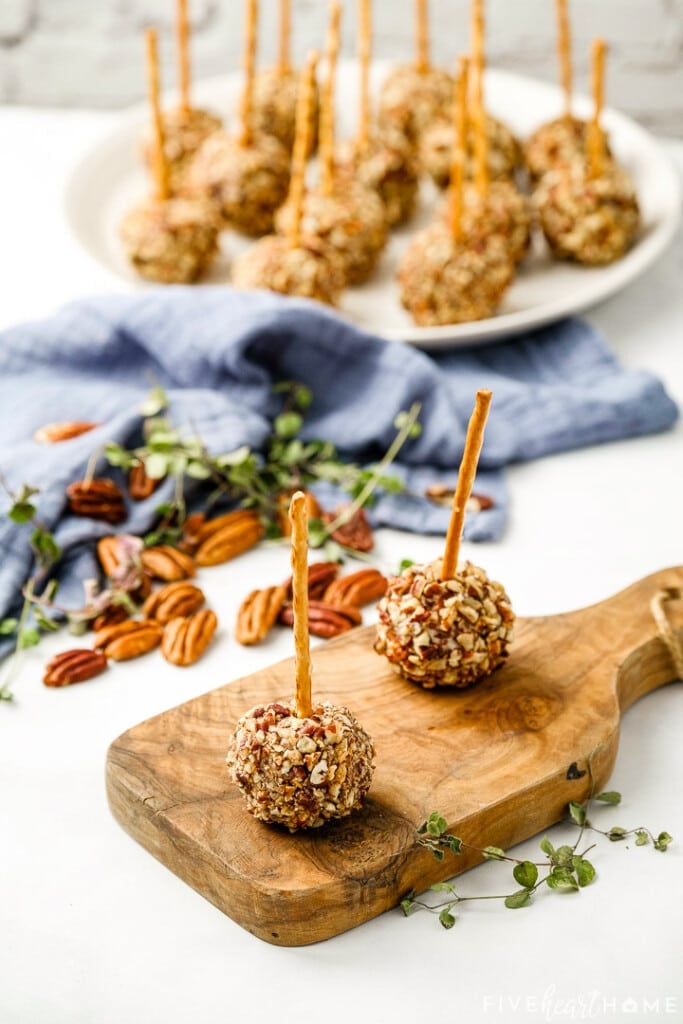 Cheese Ball Bites on platter and wooden board.