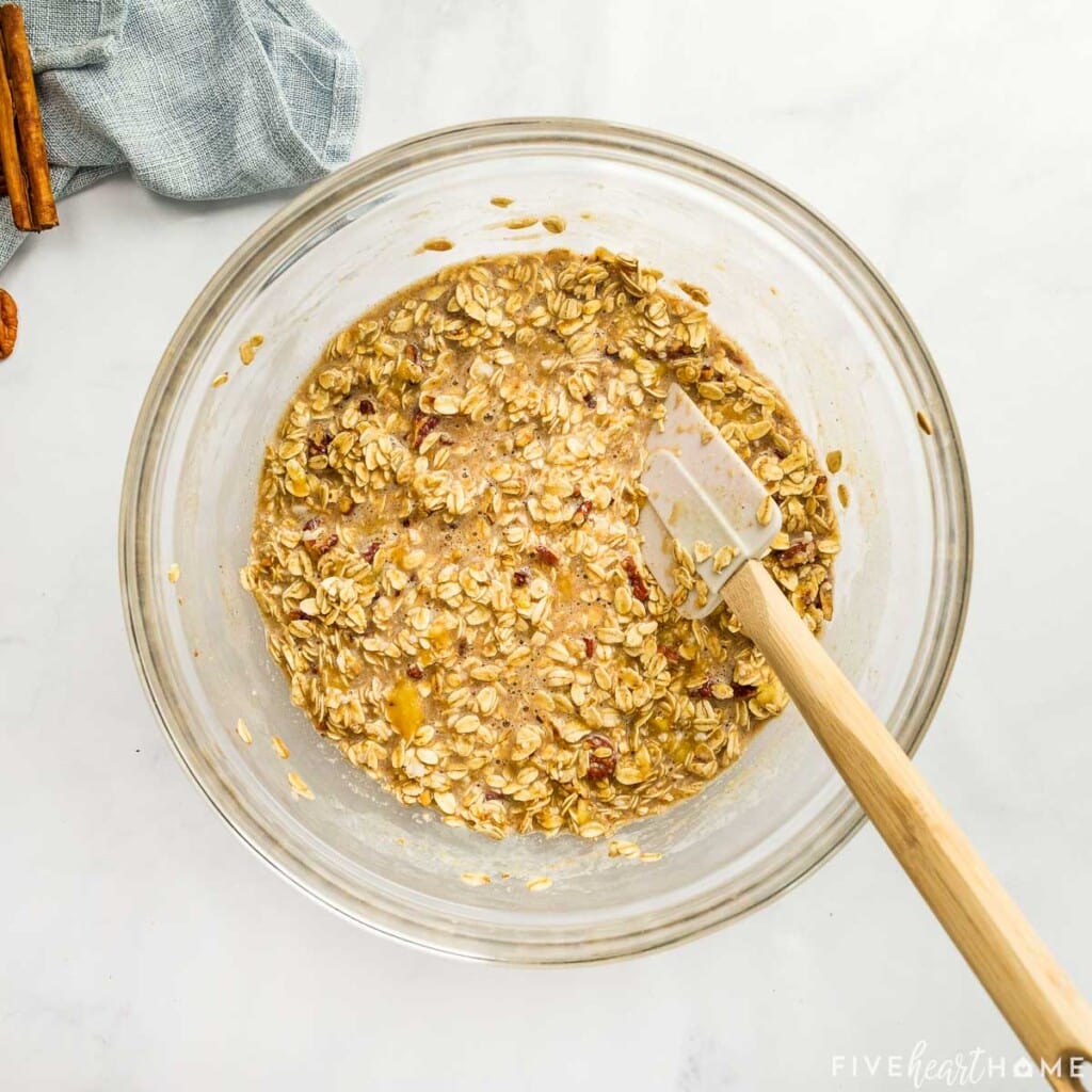 Ingredients combined and ready for baking dish for pumpkin oatmeal bake.