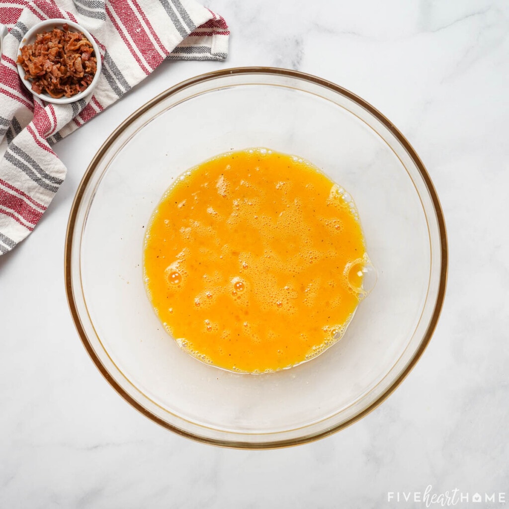 Eggs whisked together for Mini Frittatas.