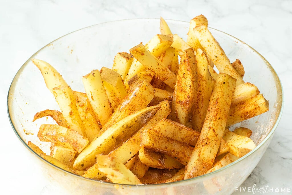 How to season fries in glass bowl.