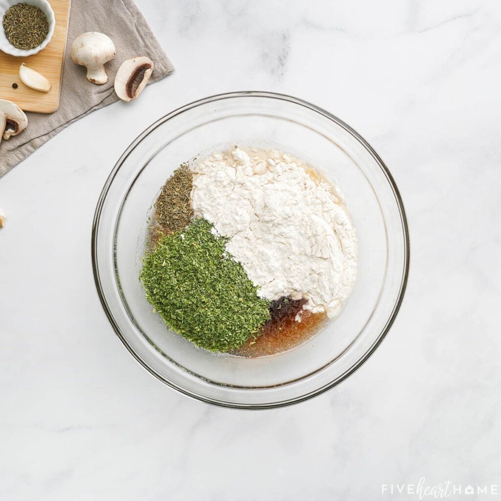 Sauce ingredients in glass bowl.