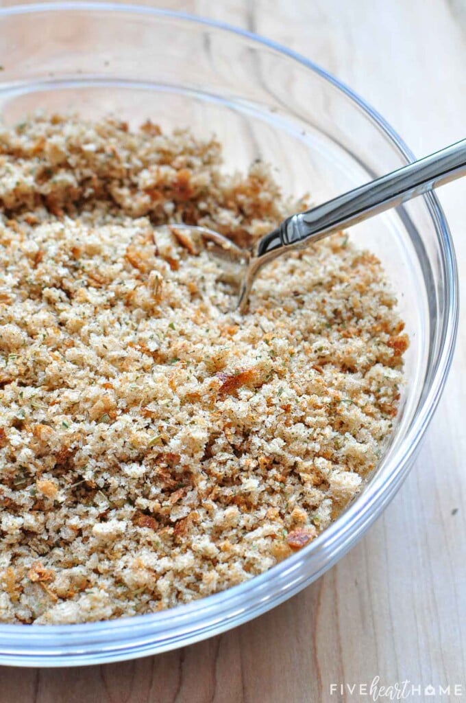 Italian Bread Crumbs Recipe in bowl with spoon.