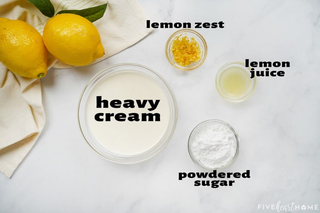 Aerial view of labeled ingredients to make Lemon Whipped Cream recipe.