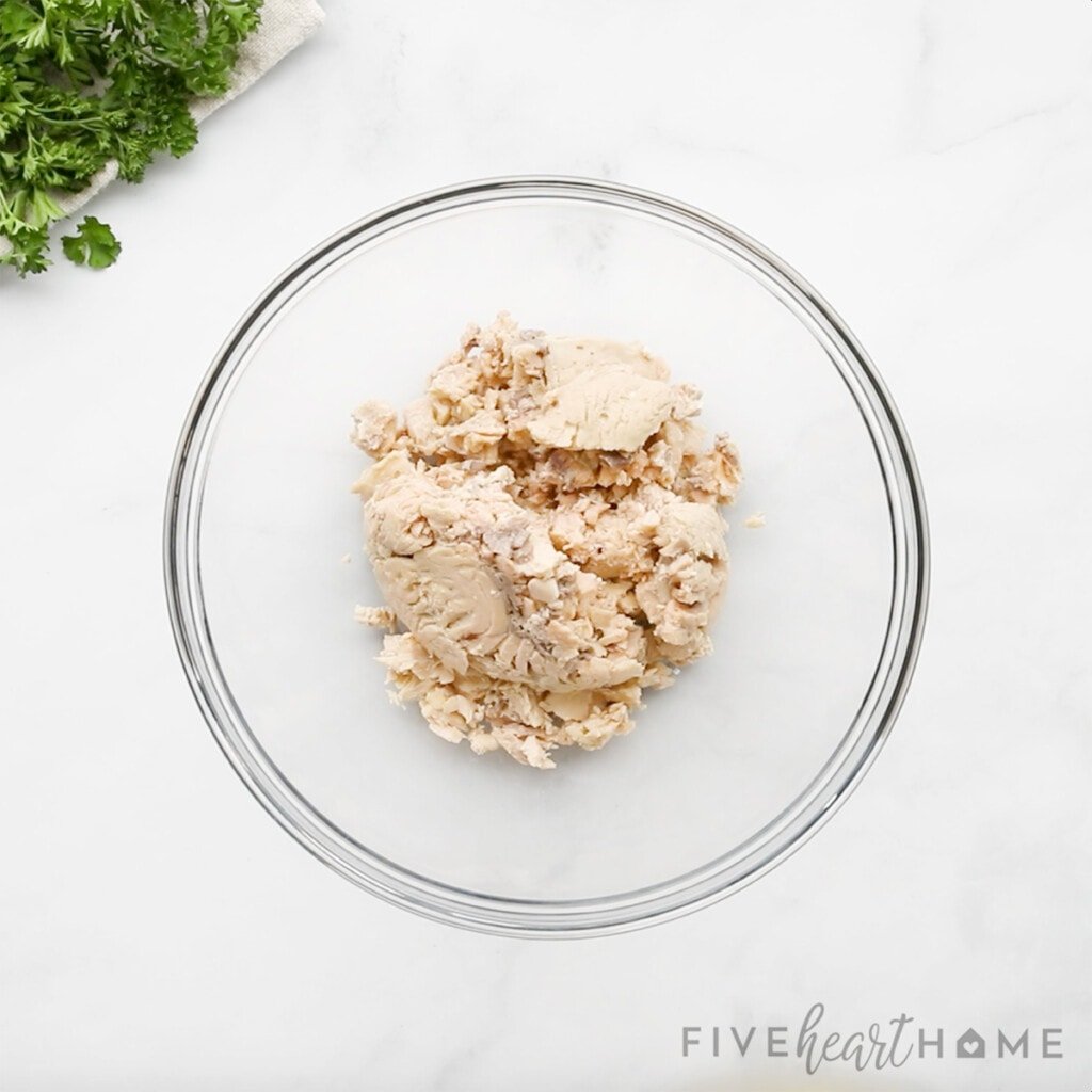 Canned salmon in bowl to make Salmon Patty recipe.