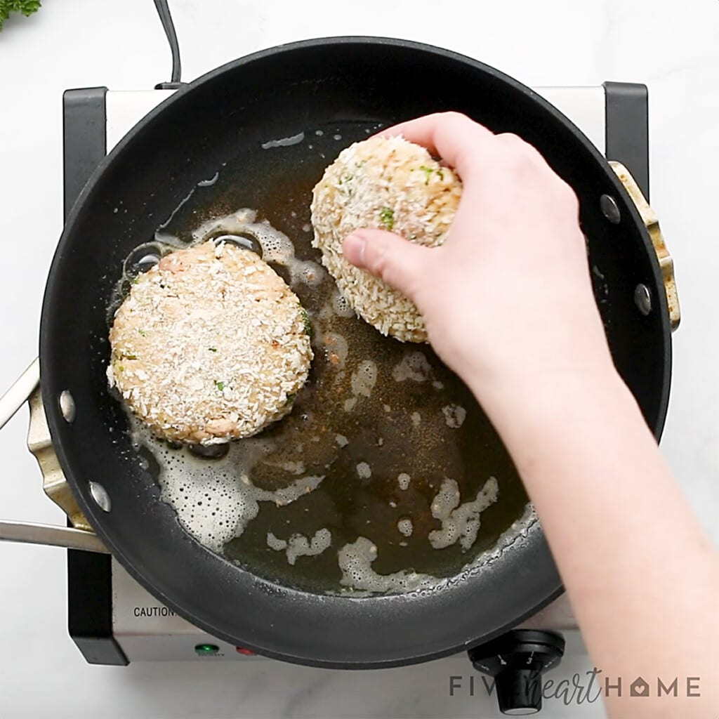 Laying Salmon Patties in pan.