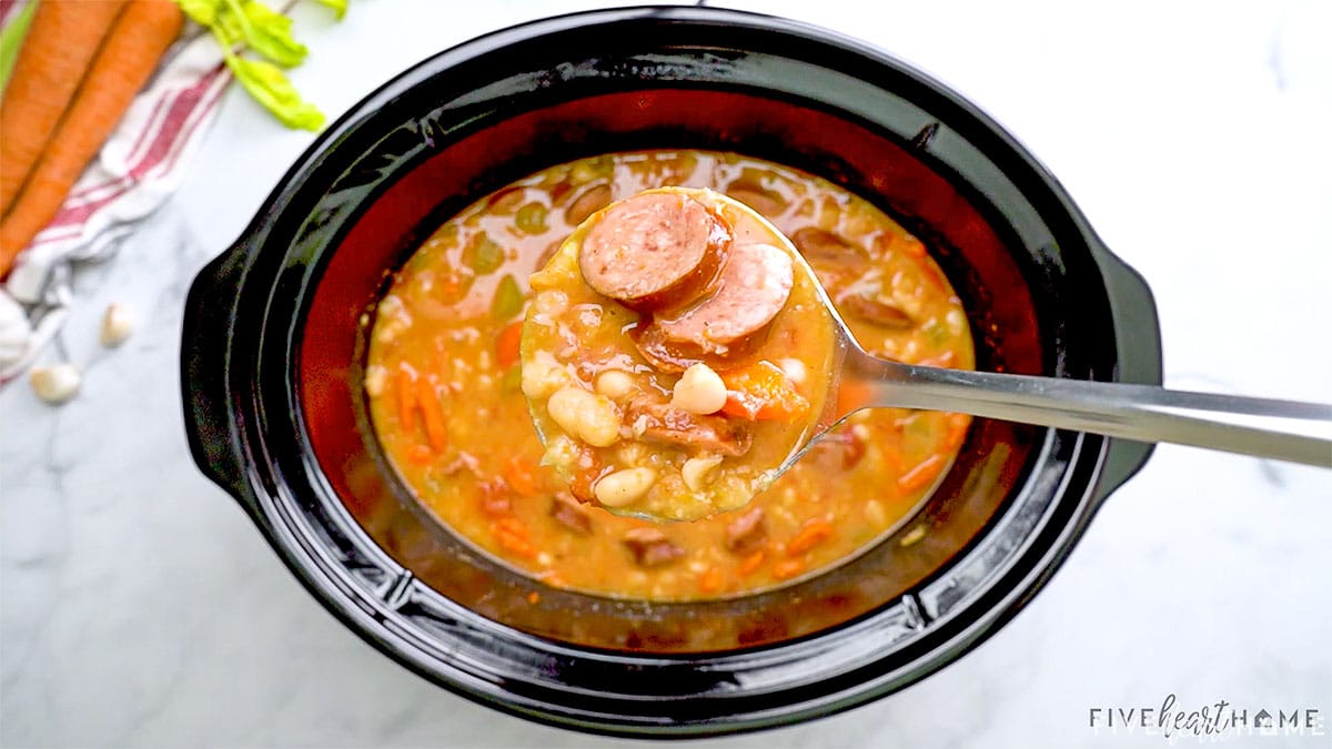 Ladle of Cajun Soup with sausage.