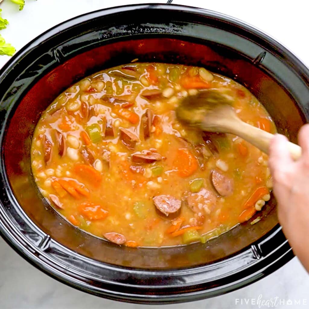 Stirring puree into Cajun Bean Soup.