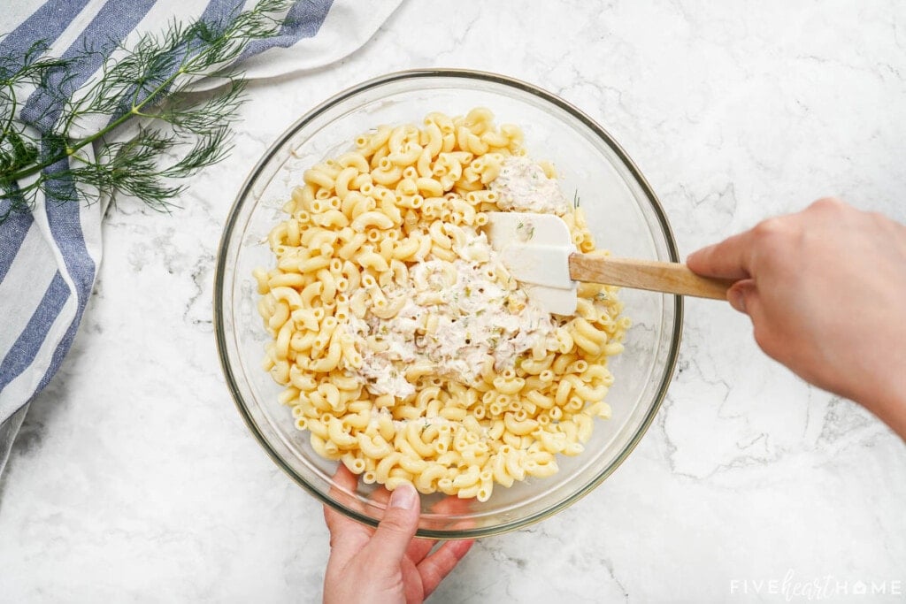 Tuna macaroni salad stirred together.