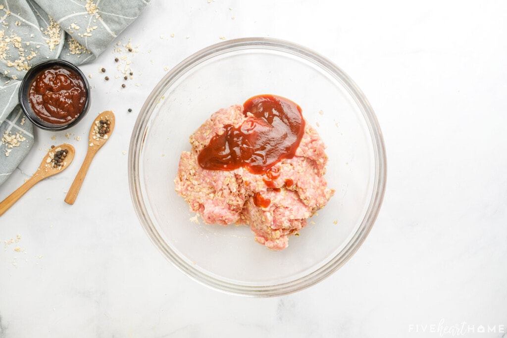 Adding sauce to turkey meatloaf mixture.