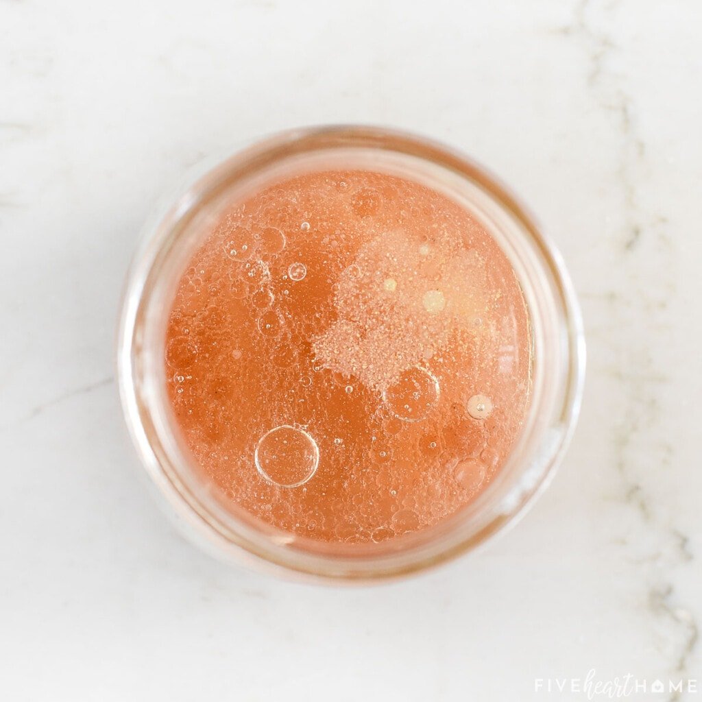 Aerial view of Blush Wine Vinaigrette recipe in mason jar.