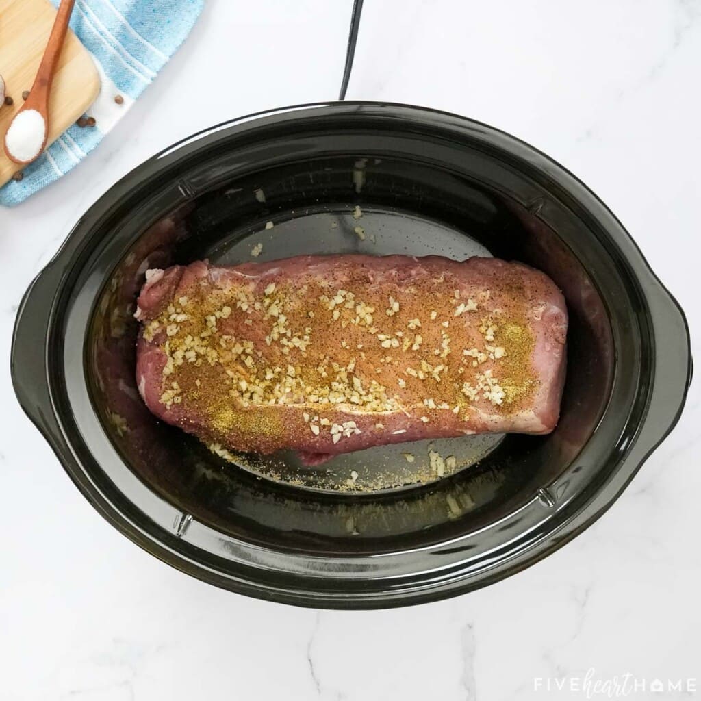 Pork loin crock pot with spice rub and garlic.