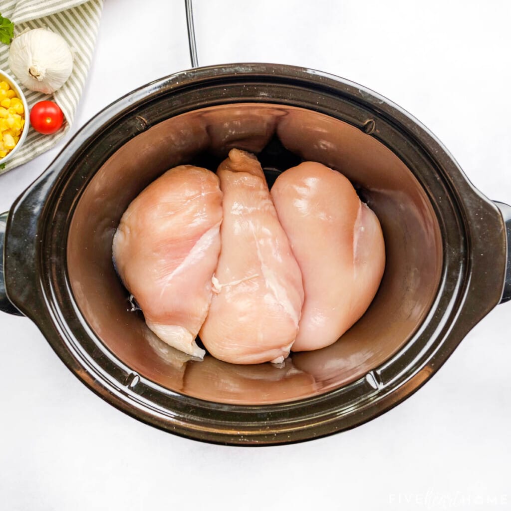 Chicken breasts in slow cooker.