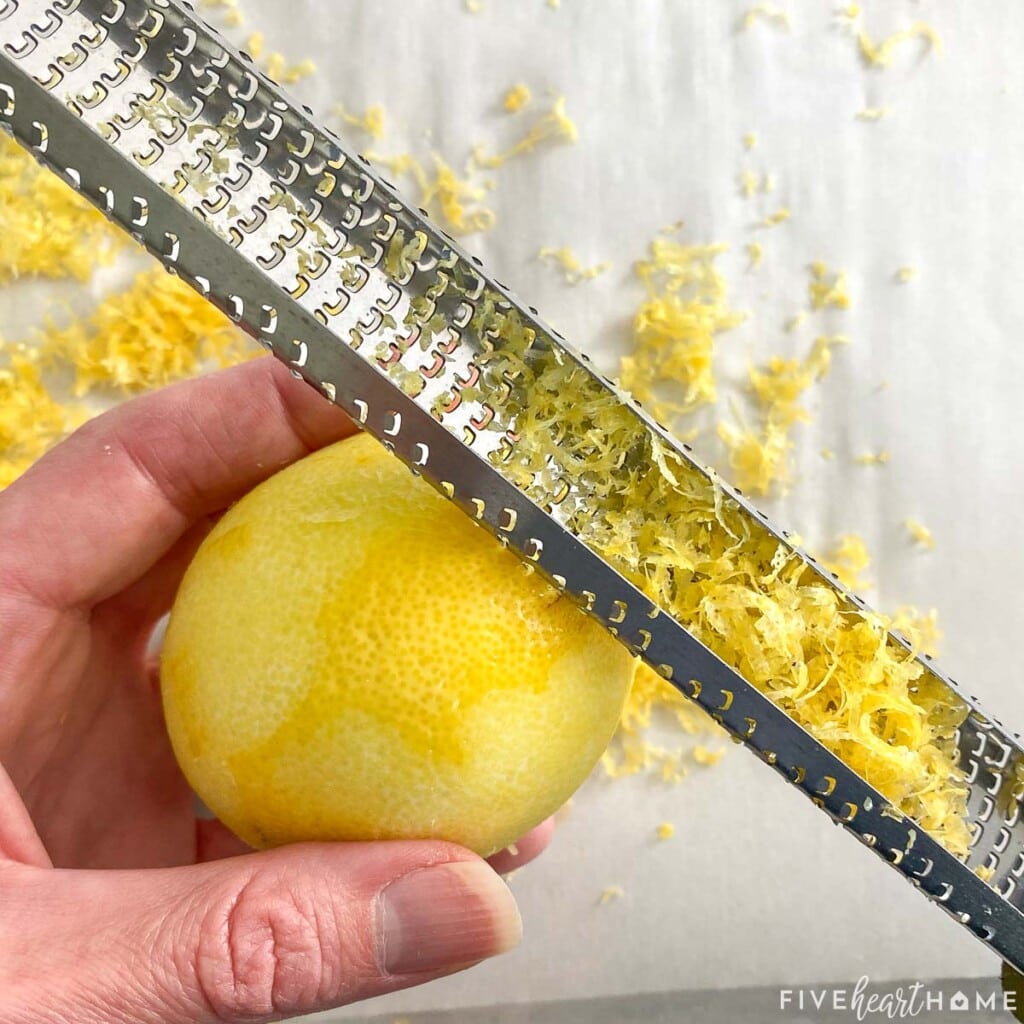 Zesting lemon with a microplane.