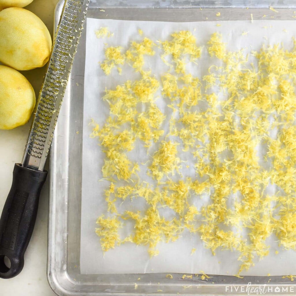 Aerial view of lemon zest on sheet pan ready to bake to make Lemon Pepper.