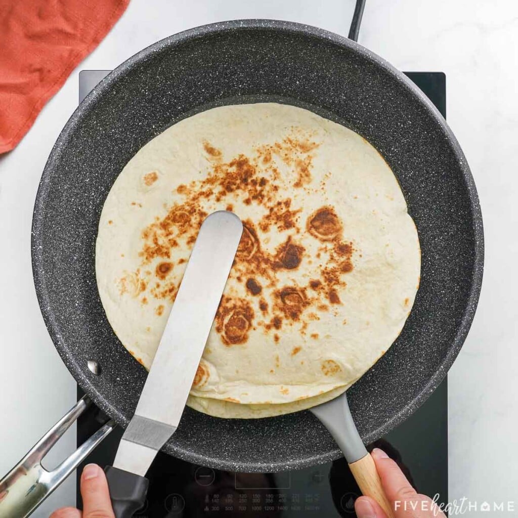 Flipping over pizzadilla.