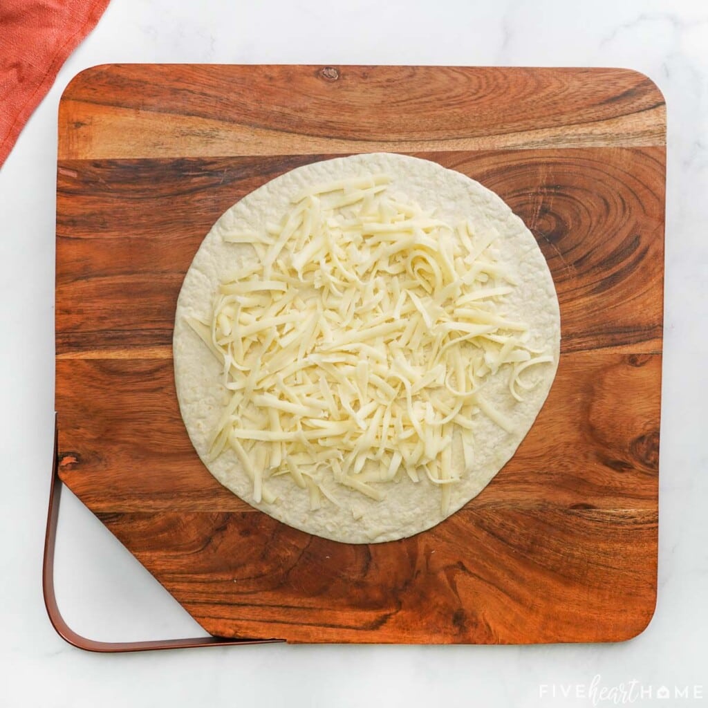 Mozzarella cheese on flour tortilla.