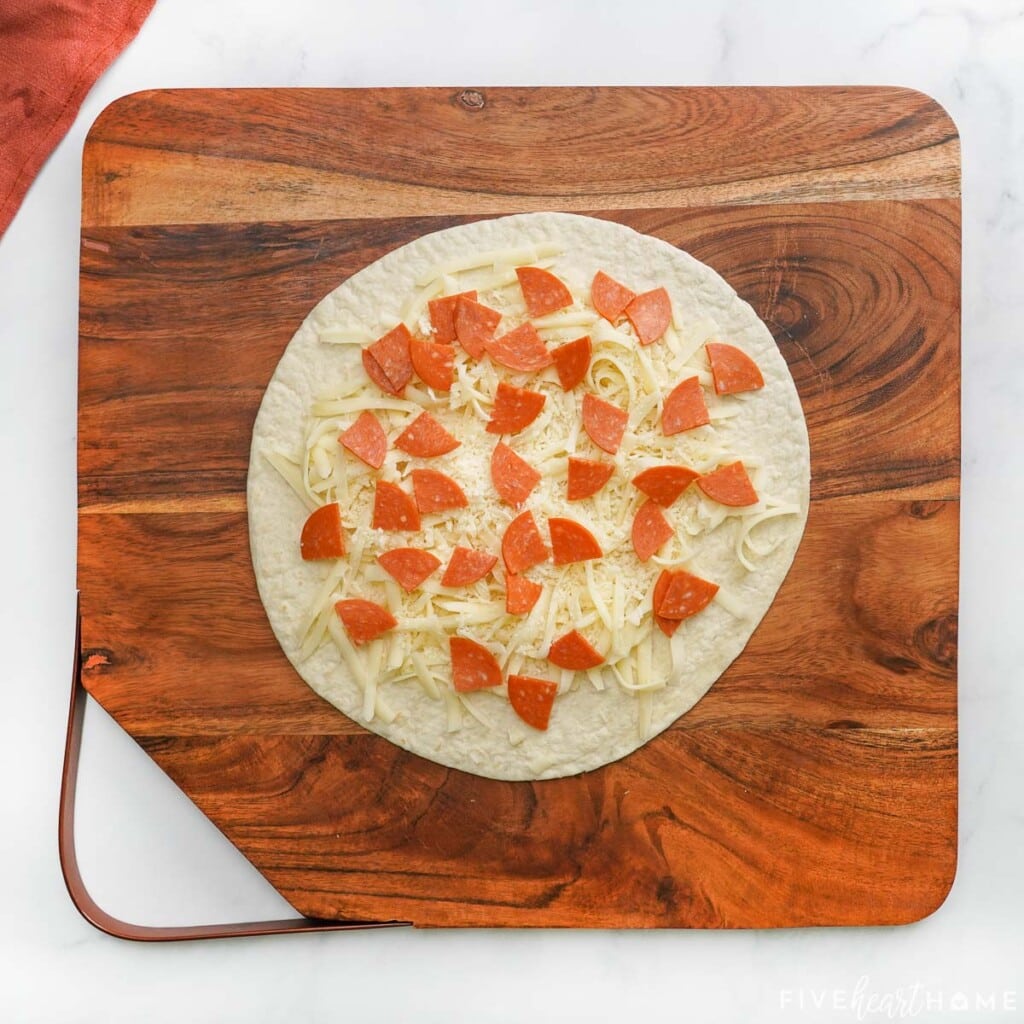 Pepperoni arranged on Pizza Quesadilla recipe.