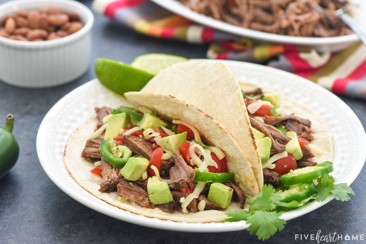 Crock Pot Shredded Beef for Tacos on plate.