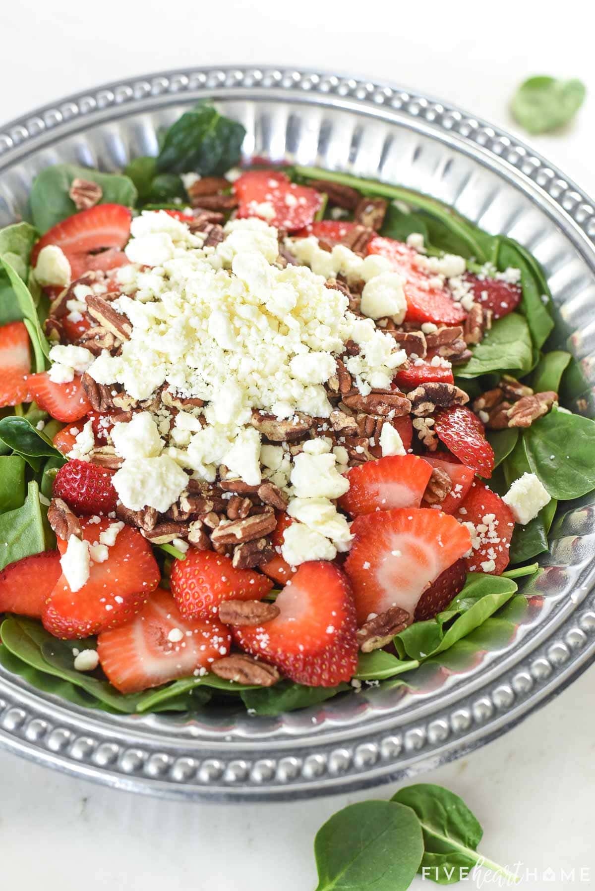 Spinach Salad with Strawberries, pecans, feta, & Homemade Blush Wine Vinaigrette.