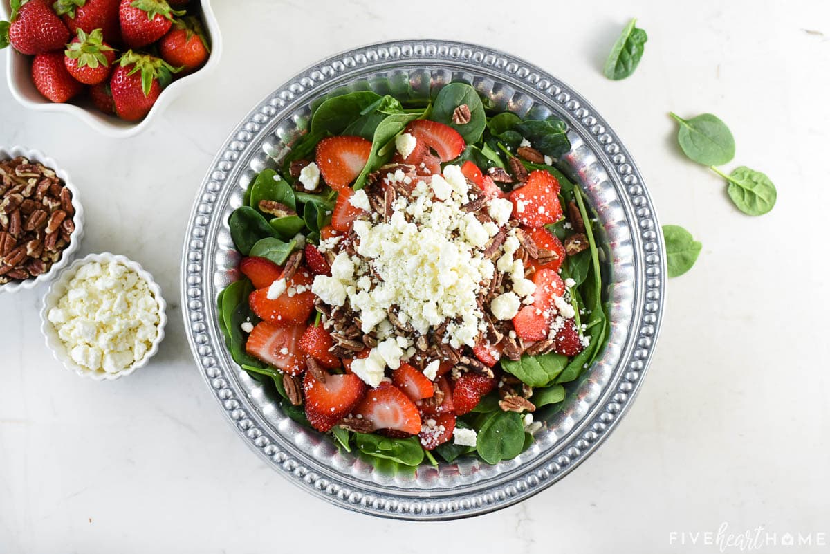 Crumbled feta for the final layer of the Spinach Salad with Strawberries.