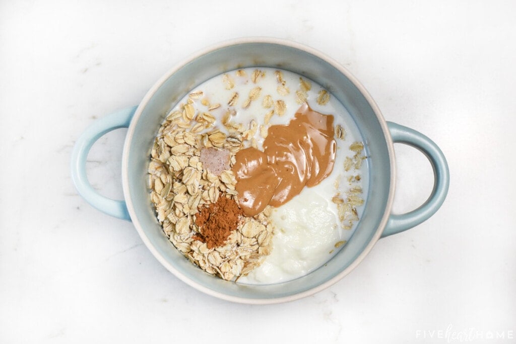 Ingredients in bowl to make Overnight Oats with Peanut Butter.