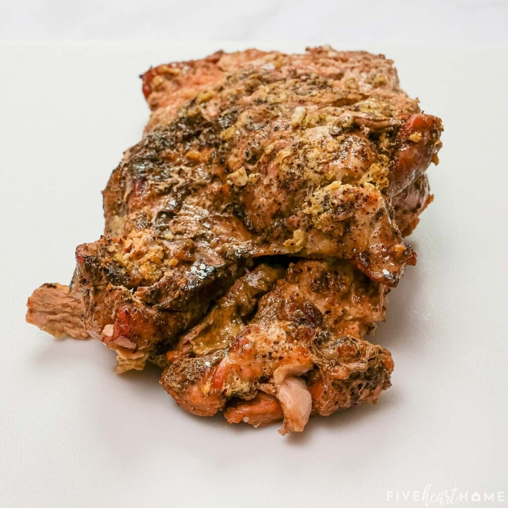 Root Beer Pulled Pork on cutting board.