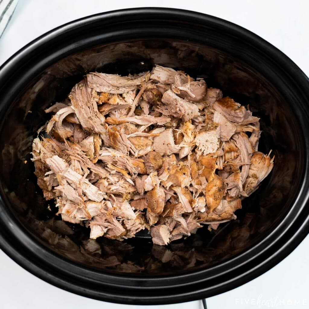 Shredded meat back in crock pot.