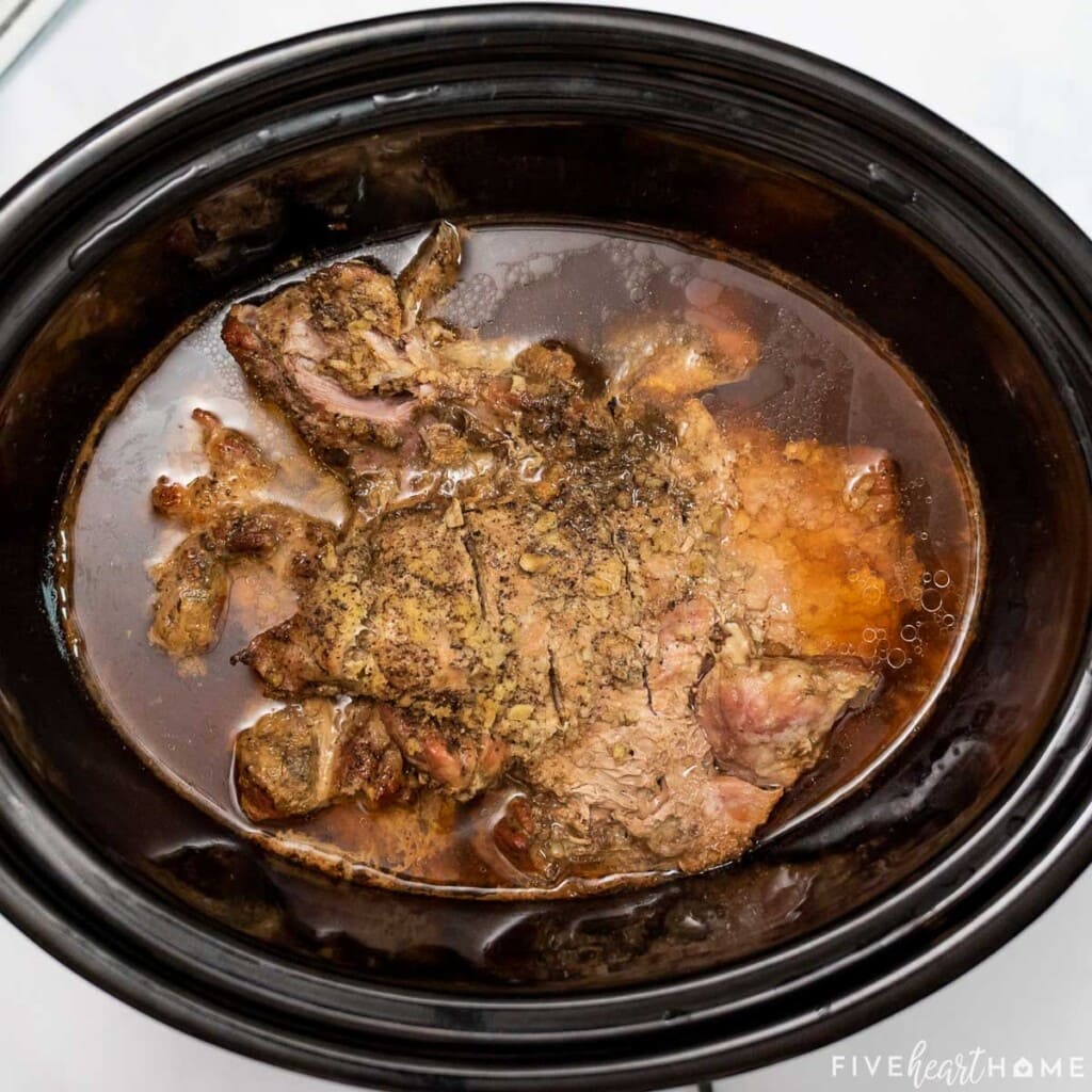 Root Beer Pulled Pork cooked in crock pot.