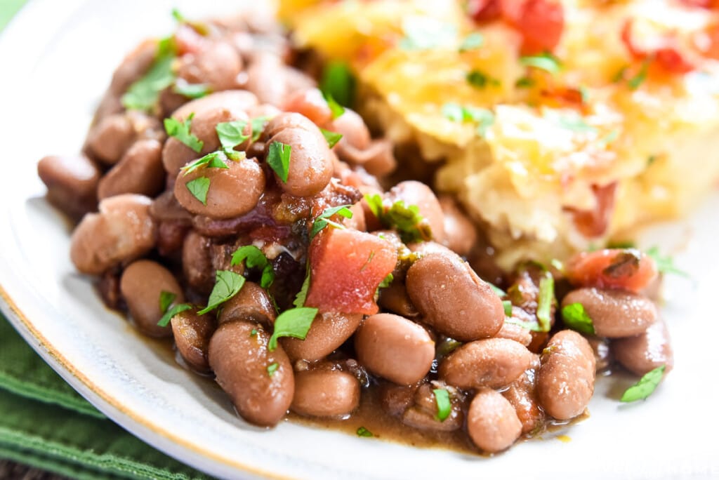 Close-up of Charro Beans on plate.
