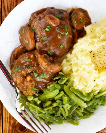 Aerial view of Hamburger Steak with Mushroom Gravy on plate.