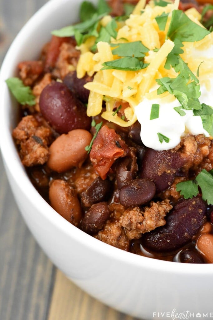 Close-up of Three Bean Chili with toppings.
